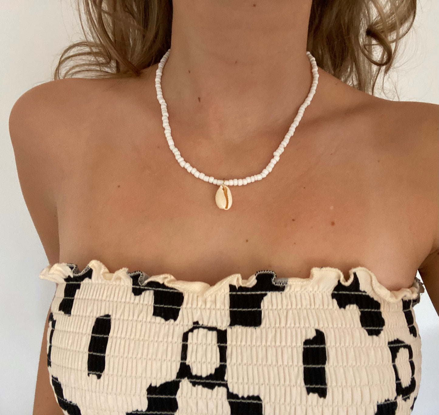 Shell with best sale pearl necklace